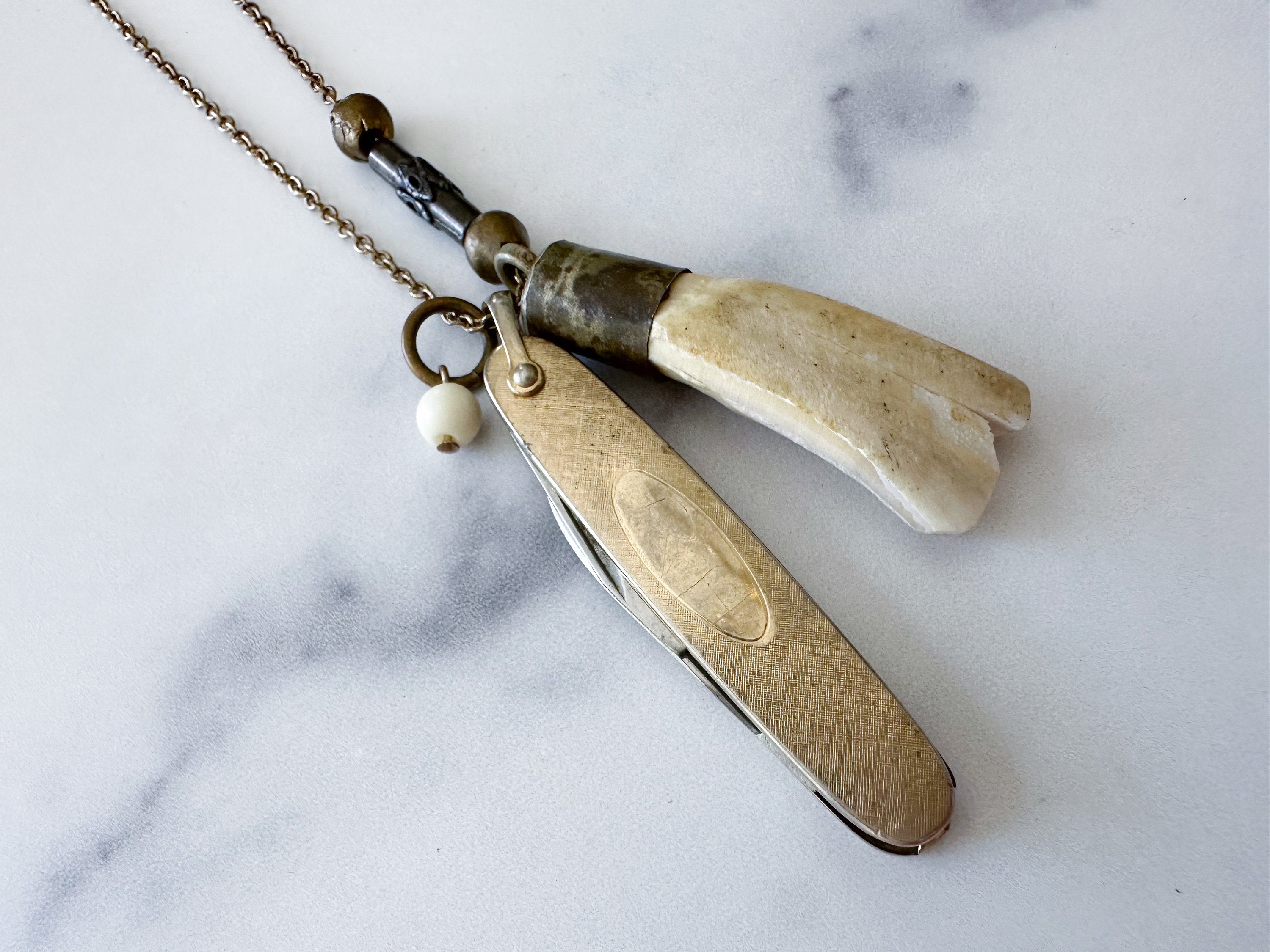 Doe Knife Necklace - Vintage Gold-Tone Folding Knife, Deer Tooth Pendant, Vintage Charm & Reclaimed Chain Statement Necklace