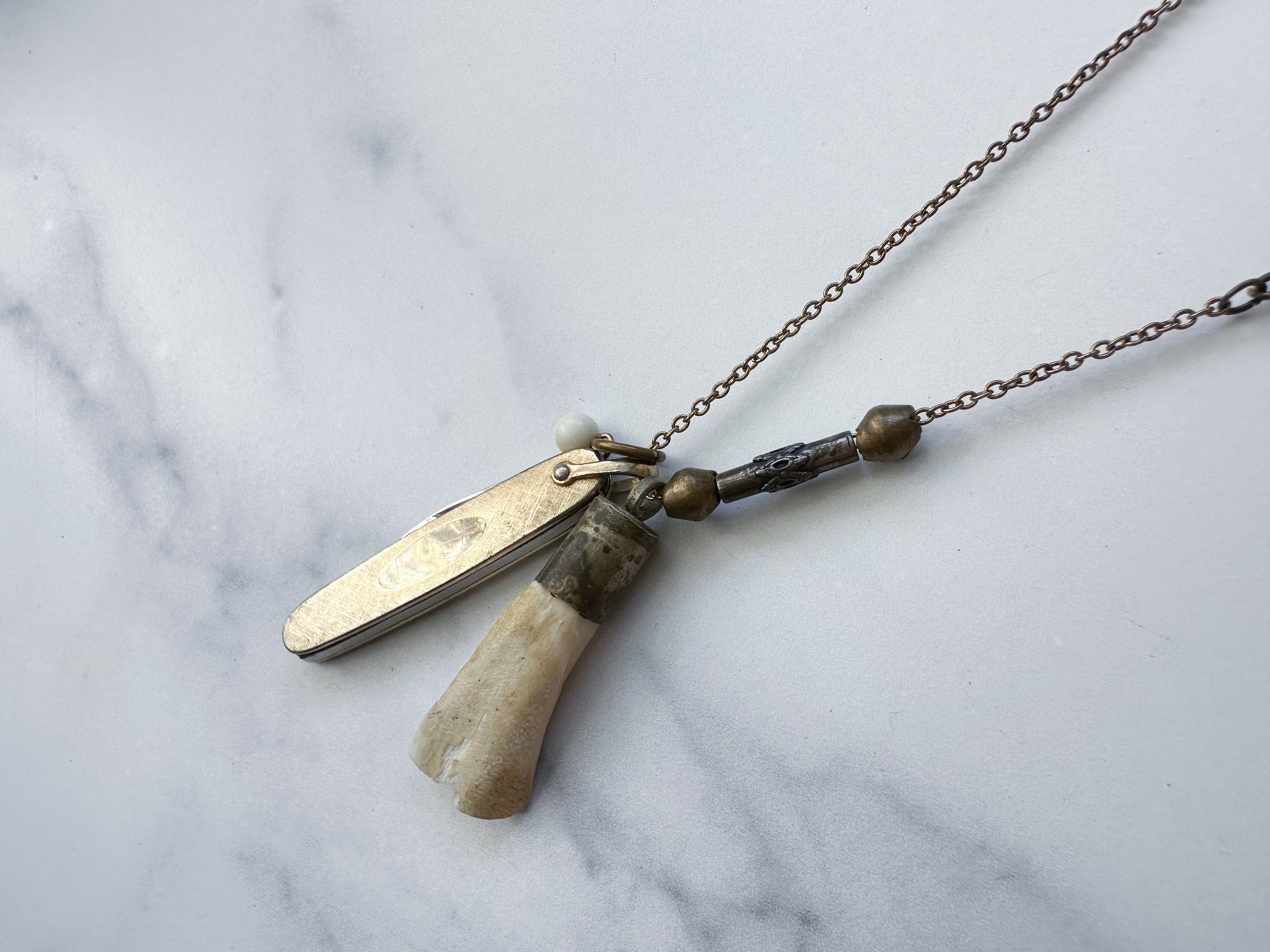 Doe Knife Necklace - Vintage Gold-Tone Folding Knife, Deer Tooth Pendant, Vintage Charm & Reclaimed Chain Statement Necklace