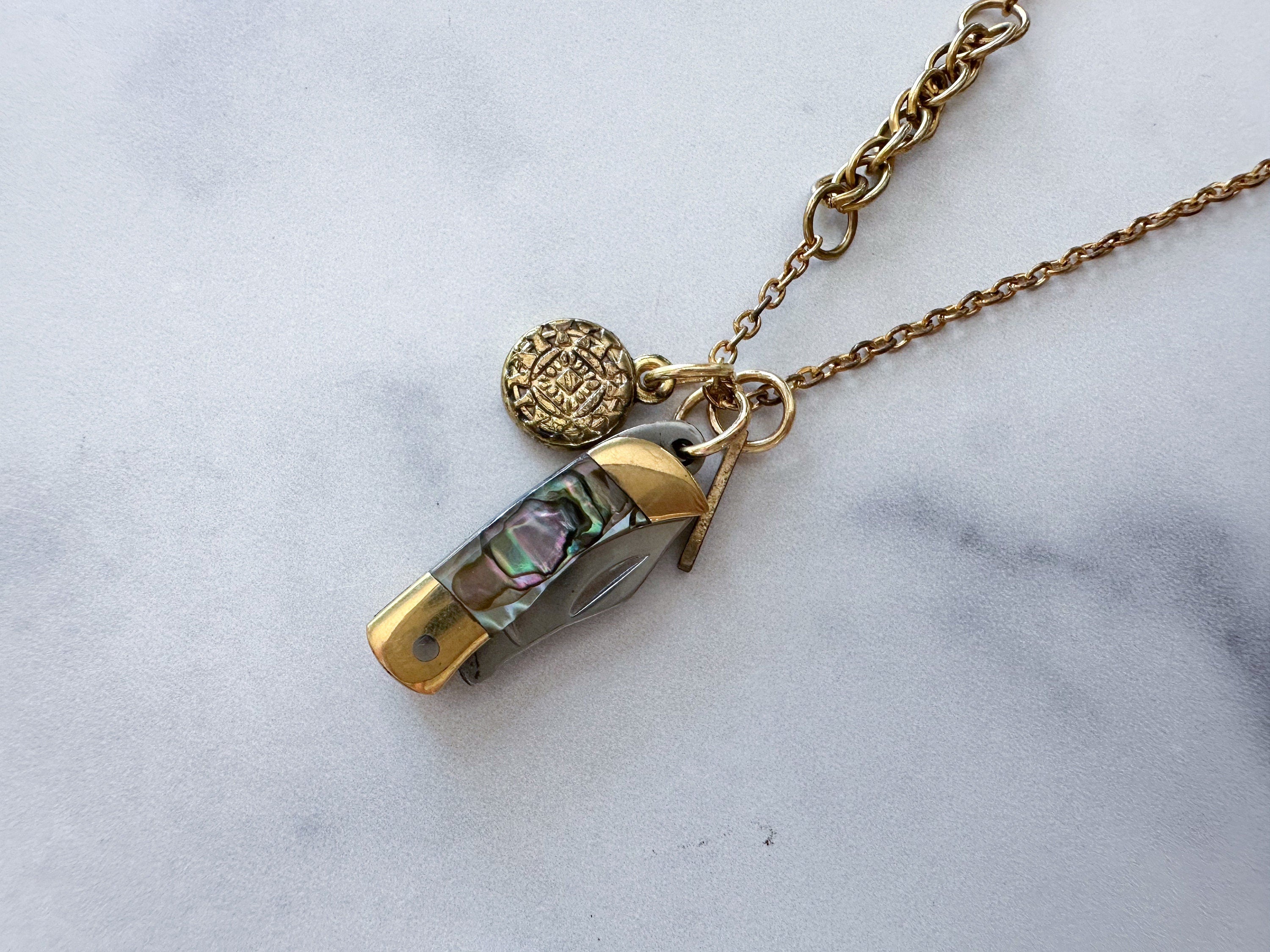 Luck Knife Necklace - Gold-Tone Shell Mother of Pearl Folding Knife, Vintage Gold-Tone Charms & Patchwork Reclaimed Chain Statement Necklace